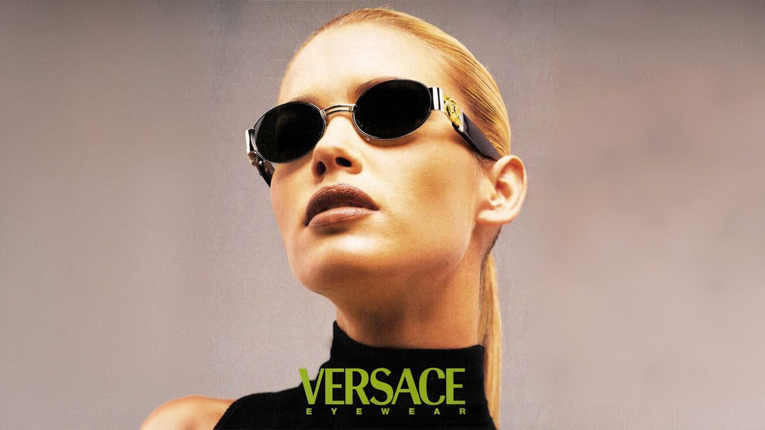 Blonde women wearing black vintage versace sunglasses