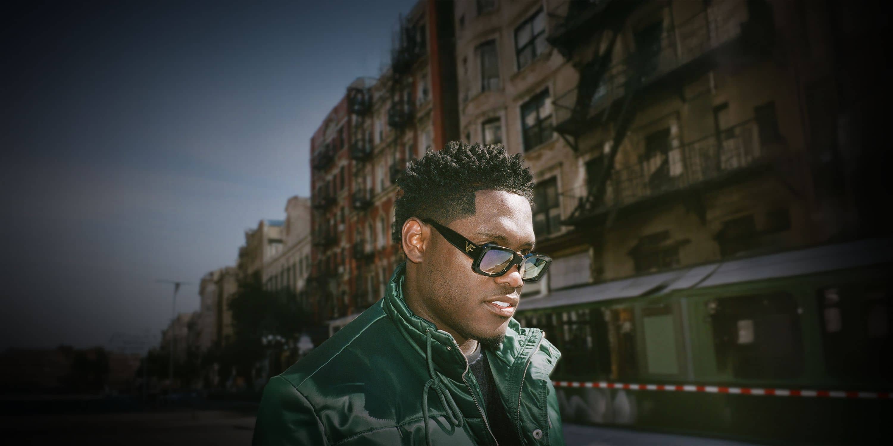 Man wearing black prescription glasses outside in new york city